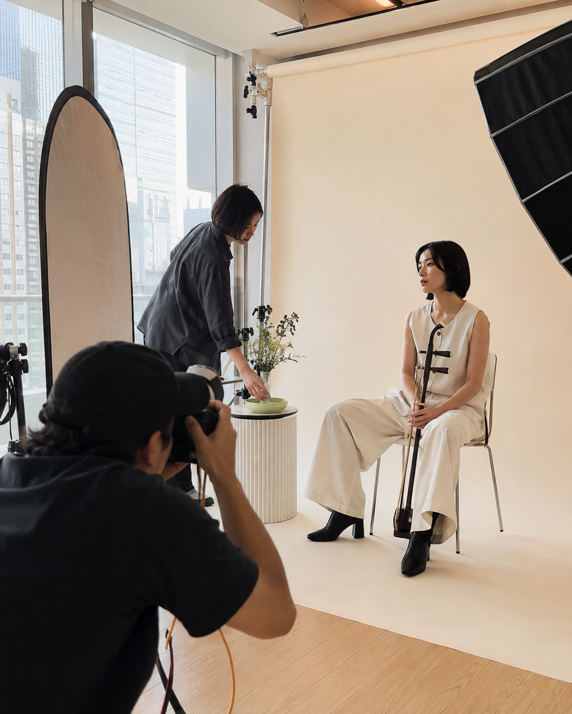 Bright editorial portrait production inside a Hong Kong studio